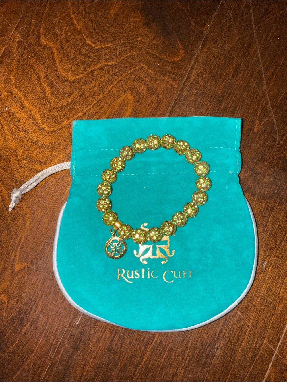 Rustic Cuff Gold and Green Glitter Bead Bracelet with Logo Charm
